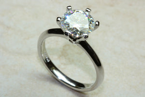 Charles and Colvard Forever One diamond solitaire, One carat diamond set in six claw platinum ring