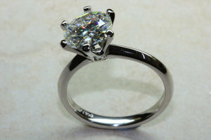 Charles and Colvard Forever One diamond solitaire, One carat diamond set in six claw platinum ring