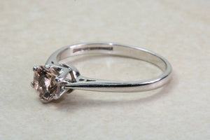 Simple Natural Morganite Solitaire. 18ct White Gold. Simple ring set with over Half carat Round cut Morganite