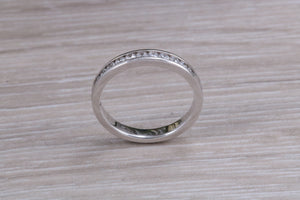 Round cut Diamonds Channel set Band