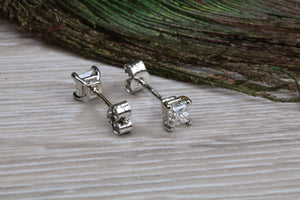 Elegant Princess cut Diamond Platinum Solitaire Stud Earrings