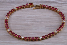 Load image into Gallery viewer, The Ultimate Ruby and Diamond set line bracelet, all natural non treated Rubies with D VVS1 grade natural diamonds set in 18ct yellow gold