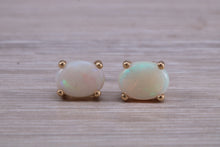 Load image into Gallery viewer, Oval cut Fiery Opal set Yellow Gold Stud Earrings