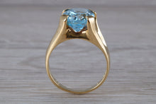 Load image into Gallery viewer, Large 9 carat Oval cut Blue Topaz set 18ct Yellow Gold Ring