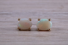 Load image into Gallery viewer, Oval cut Fiery Opal set Yellow Gold Stud Earrings