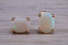 Load image into Gallery viewer, Oval cut Fiery Opal set Yellow Gold Stud Earrings