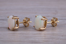 Load image into Gallery viewer, Oval cut Fiery Opal set Yellow Gold Stud Earrings