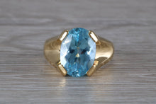 Load image into Gallery viewer, Large 9 carat Oval cut Blue Topaz set 18ct Yellow Gold Ring