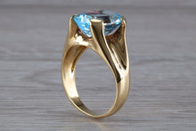 Load image into Gallery viewer, Large 9 carat Oval cut Blue Topaz set 18ct Yellow Gold Ring