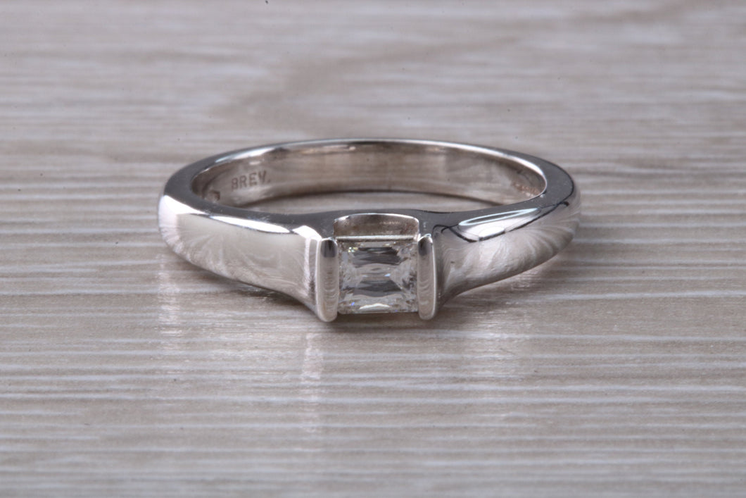 Chunky Diamond Solitaire set with this Stunning Princess cut Diamond