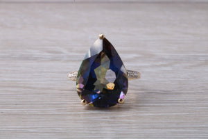 Large 13 carats Mystic Blue Topaz and Diamond set Yellow Gold Ring