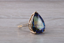 Load image into Gallery viewer, Large 13 carats Mystic Blue Topaz and Diamond set Yellow Gold Ring