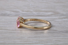 Load image into Gallery viewer, Oval Pink Topaz set Yellow Gold Trilogy Ring