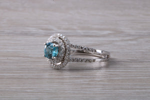 Blue Zircon and Diamond Double Halo set Ring