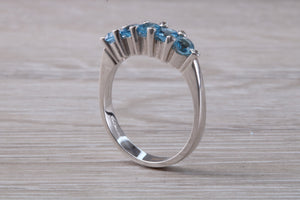 Blue topaz and diamond set ring. 18ct white gold with real diamonds and real topaz