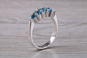 Blue topaz and diamond set ring. 18ct white gold with real diamonds and real topaz