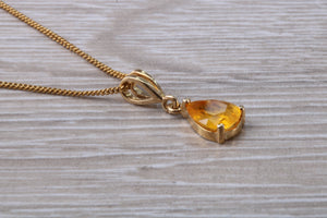Natural yellow Sapphire necklace, Pear drop cut yellow sapphire set in 9ct yellow gold together with 18 inch long 9ct yellow gold chain
