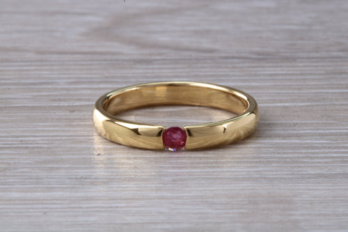 Tension set Natural Ruby Gold Band