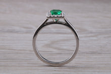 Load image into Gallery viewer, Emerald and Diamond Halo set Platinum Ring