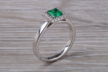 Load image into Gallery viewer, Emerald and Diamond Halo set Platinum Ring