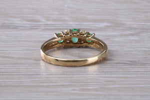 Emerald and Diamond set Yellow Gold Ring