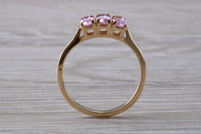 Load image into Gallery viewer, Oval Pink Topaz set Yellow Gold Trilogy Ring