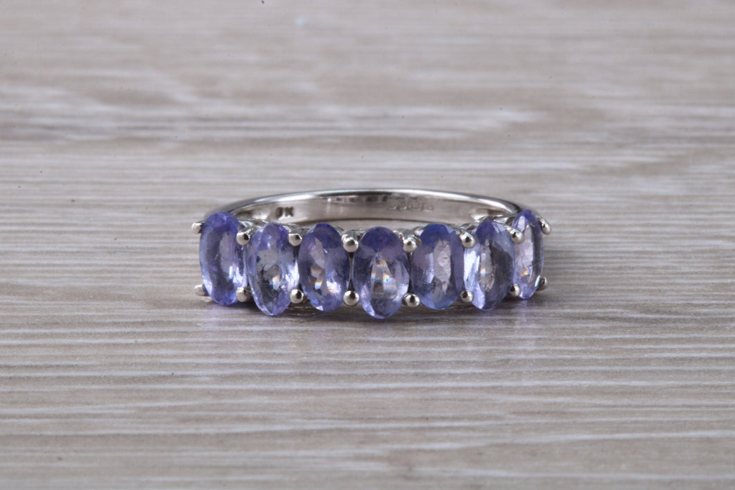 7 stone natural Tanzanite eternity ring, oval cut Tanzanite set in 9ct white gold, one and half carats Tanzanite