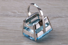 Load image into Gallery viewer, Very Large 70 carat Sky Blue Topaz set White Gold Statement Ring