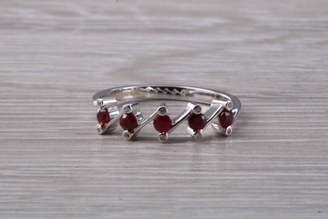 Dainty Ruby and Diamond ring. very unusual styled band in 18ct white gold