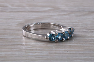 Blue topaz and diamond set ring. 18ct white gold with real diamonds and real topaz