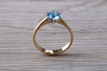 Load image into Gallery viewer, One carat Swiss Blue Topaz set Gold Ring