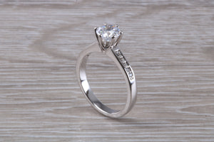 Platinum set Charles and Colvard Two carat Forever One Mossainte complemented with Natural Diamonds set Ring
