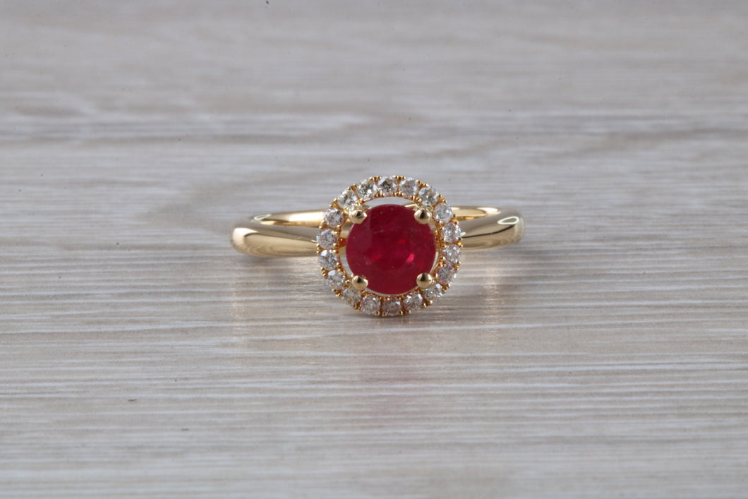 Stunning One carat Ruby and Halo set Diamond Ring