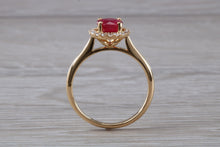 Load image into Gallery viewer, Stunning One carat Ruby and Halo set Diamond Ring