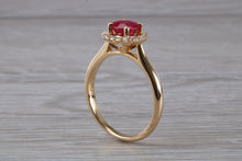 Load image into Gallery viewer, Stunning One carat Ruby and Halo set Diamond Ring