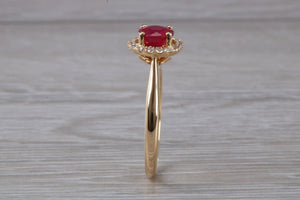 Stunning One carat Ruby and Halo set Diamond Ring