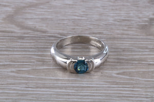 One carat Round cut Blue Topaz Ring