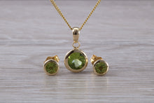 Load image into Gallery viewer, Round cut Peridot Earrings and Matching Necklace set in Yellow Gold