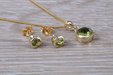 Load image into Gallery viewer, Round cut Peridot Earrings and Matching Necklace set in Yellow Gold