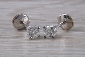 One carat Moissanite Diamond Solitaire set Platinum Stud Earrings