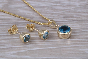 Round cut Blue Topaz Matching Earrings and Necklace set in Yellow Gold