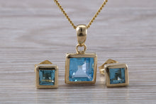 Load image into Gallery viewer, Square cut Blue Topaz Matching Earrings and Matching Necklace set in Yellow Gold