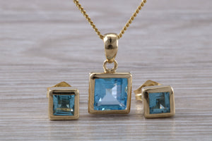 Square cut Blue Topaz Matching Earrings and Matching Necklace set in Yellow Gold