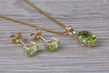 Load image into Gallery viewer, Oval cut Peridot Earrings and Matching Necklace set in Yellow Gold