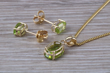 Load image into Gallery viewer, Oval cut Peridot Earrings and Matching Necklace set in Yellow Gold