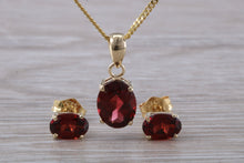 Load image into Gallery viewer, Oval cut Garnet Earrings and Matching Necklace set in Yellow Gold