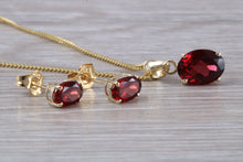 Load image into Gallery viewer, Oval cut Garnet Earrings and Matching Necklace set in Yellow Gold