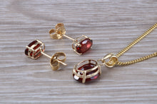 Load image into Gallery viewer, Oval cut Garnet Earrings and Matching Necklace set in Yellow Gold