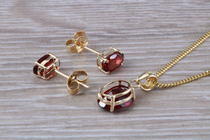 Oval cut Garnet Earrings and Matching Necklace set in Yellow Gold