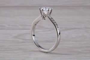 Platinum set Charles and Colvard Two carat Forever One Mossainte complemented with Natural Diamonds set Ring